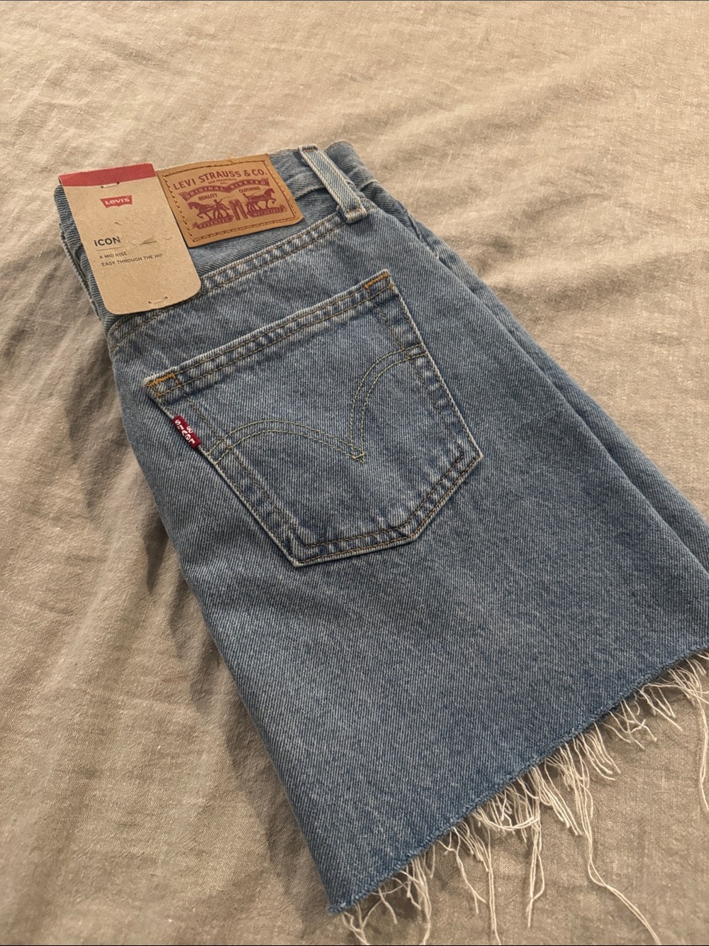 Levi's Light Blue Denim Mini Skirt with Frayed Hem